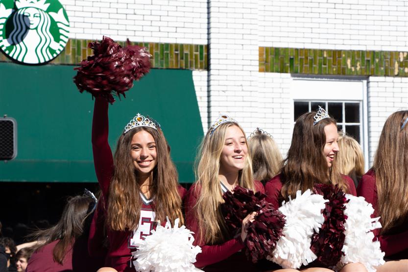 Students participate in the homecoming parade